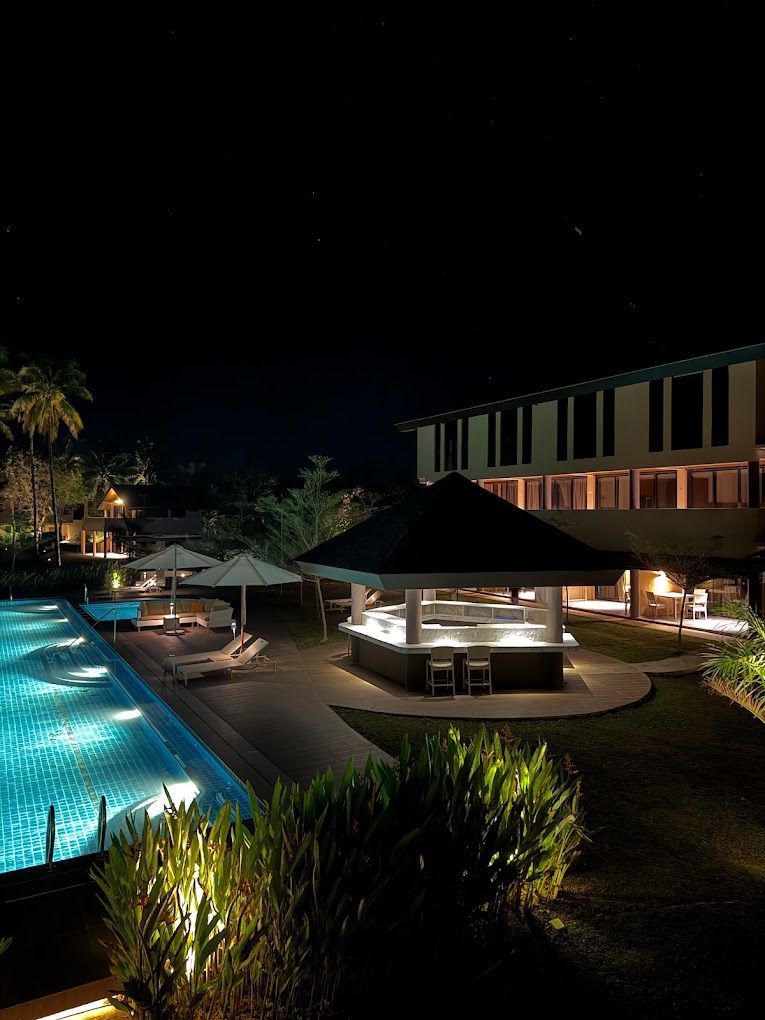 Poolside bar lit at night
